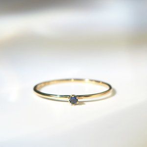 Satomi Kawakita tiny sapphire ring